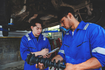 Mechanic inspects and maintains the engine for the customer. An app to write checklists for repair machines, car services and maintenance to the clipboard.