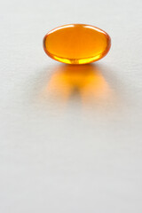 Detail of orange pills in packaging and isolated