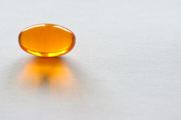 Detail of orange pills in packaging and isolated