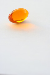 Detail of orange pills in packaging and isolated