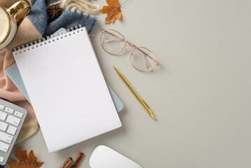 Working from home in autumn concept. Top view photo of notepad with gilded pen and glasses,...