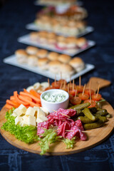 board of delicious appetizers on a wooden board