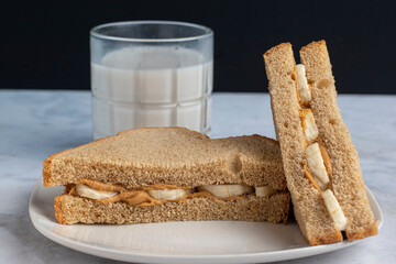 peanut butter and bananas on wheat bread