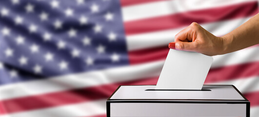 Election concept. Woman hand putting a ballot paper into a voting box on USA flag background.