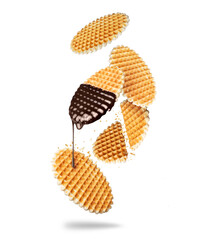 Appetizing round waffles in the air isolated on white background