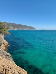 Fototapeta premium Summer sea coast landscape. View from Nature Park of Arrabida in Setubal, Portugal.