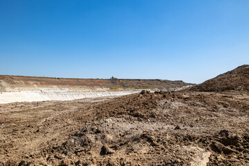 Quarry extraction porcelain clay(kaolin) and quartz sand in the open pit mine.