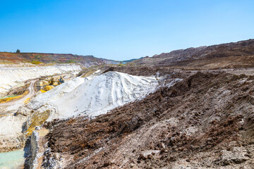 Quarry extraction porcelain clay(kaolin) and quartz sand in the open pit mine.