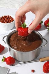 Concept of tasty and sweet food - chocolate fondue