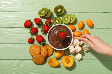 Concept of tasty sweet food - chocolate fondue
