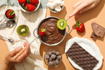 Concept of tasty sweet food - chocolate fondue