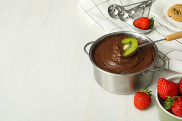 Concept of tasty sweet food - chocolate fondue