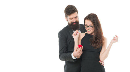 Elegant couple in love. man proposing woman to marry him. marriage proposal. celebrate special occasion. engagement or betrothal event. couple isolated on white. business deals. couple in love