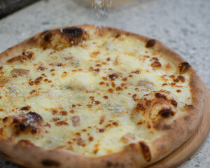 delicious homemade pizza with mozzarella on table