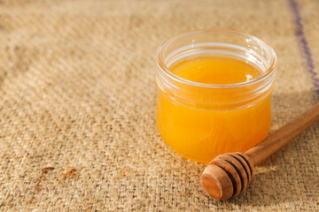 Concept of tasty and sweet food - honey with nuts