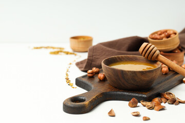 Concept of tasty and sweet food - honey with nuts
