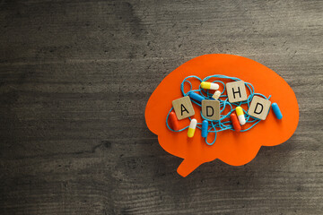 Paper brains with tangled thread, pills and letters with space for text