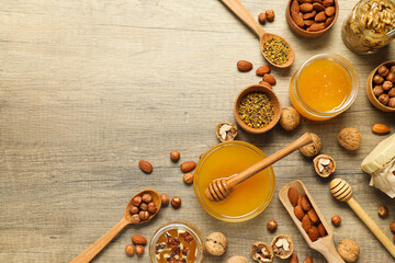 Concept of tasty and sweet food - honey with nuts