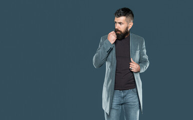 bearded mature man wear casual on grey background