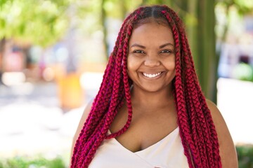 African american woman smiling confident standing at park