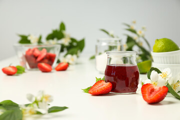 Concept of cooking tasty and sweet food - strawberry jam