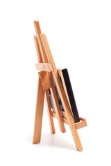 Artist wooden easel with canvas isolated on white