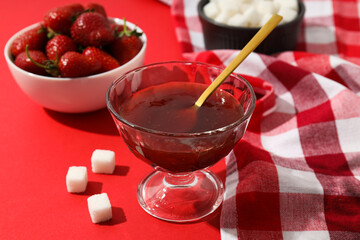 Concept of cooking tasty and sweet food - strawberry jam