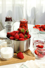 Concept of cooking tasty and sweet food - strawberry jam