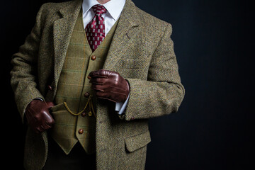 Portrait of Gentleman in Tweed Suit and Leather Gloves. Vintage Style and Retro Fashion of British...
