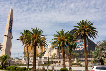 Scenic view of luxury Luxor hotel and casino on Las Vegas Strip, Nevada, USA. Tropical palm tree...