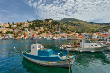 Fototapeta na wymiar Symi, a beautiful small Greek island near Rhodes, which is visited by many tourists due to its colorful houses