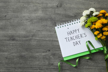 The inscription of congratulations on a notepad on the occasion of Teacher's Day