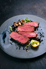 Gourmet barbecue dry aged angus roast beef steak mini pear and mushrooms in amarena cherry sauce...