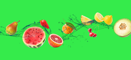 Fresh fruits and water splash on green background