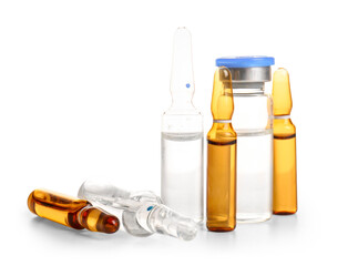Medical ampules and bottle with medicines on white background