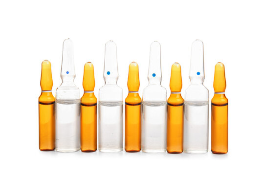 Glass medical ampules on white background