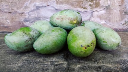 A group of green mangoes