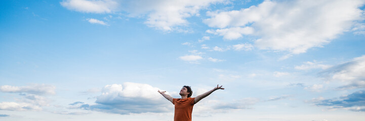 Wide view image of a young man practicing mindfulness