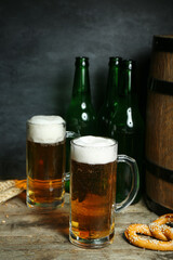 Mugs of cold beer on table. Oktoberfest celebration