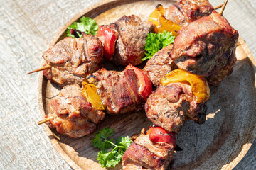 Grilled pork kebab with red and yellow pepper