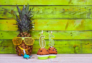 Creative card postcard happy birthday with number  65. Background character pineapple in festive...