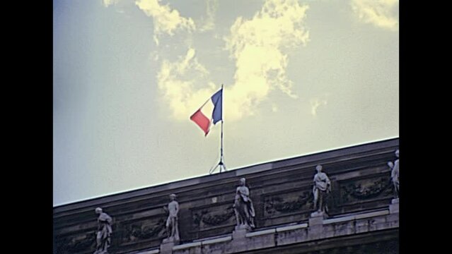 PARIS, FRANCE - CIRCA 1976: Touristic boat tour on Senna french river, at Pont Neuf and Monnaie de Paris palace, direction of Coins and Medals, the oldest continuously operating minting institution.