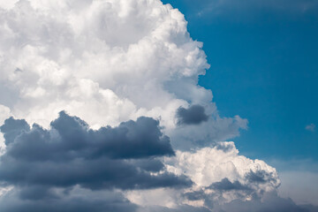 Naklejka na ściany i meble White and gray high clouds on blue sky, cloudscape background. Skyscape nature scenery