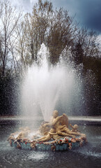 The beautiful fountain of the Roman god Saturn that sprinkles water into the pool. Saturn sits on a...