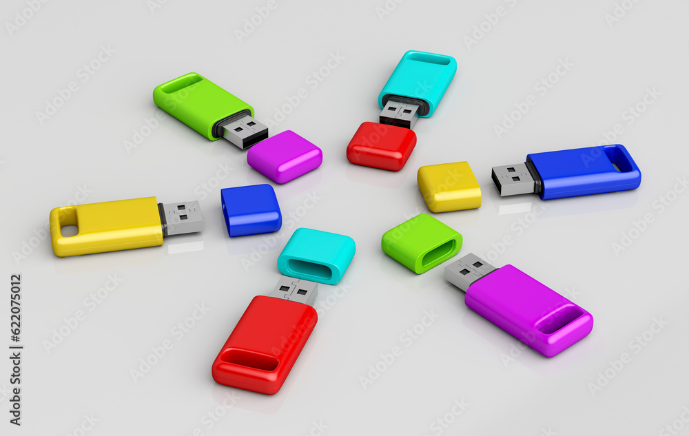 Poster group of usb memory sticks with different colors on shiny grey background