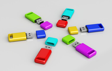 Group of usb memory sticks with different colors on shiny grey background