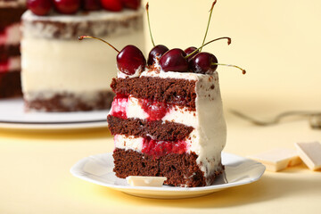 Plate with piece of tasty cherry cake on yellow background