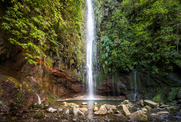 Big waterfall in the final point of popular hiking route levada 25 fontes. Rabacal, Madeira island,...