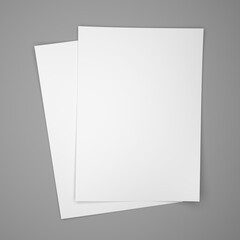 Two white paper sheets on gray background