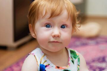 Girl-toddler surprising looking to camera